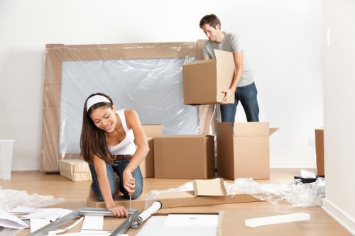 Team handling household items during a move within Southwark