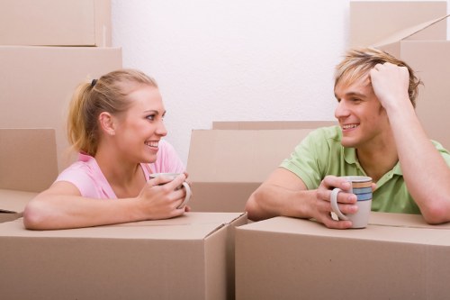 Moving team handling boxes during a Southwark removals service