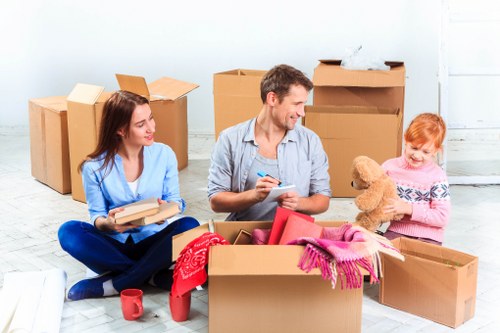 House removalists packing and loading boxes in Southwark