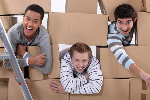 Loading furniture into a van for transport in Southwark