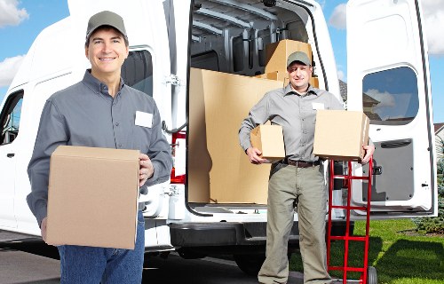 Family preparing for home moves in Southwark with labelled boxes